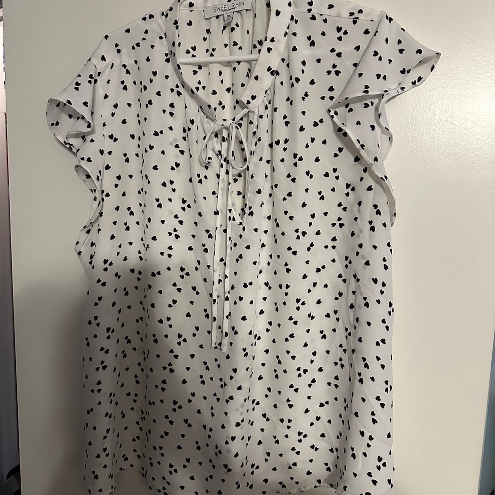 Sweet Rain Young Contemporary white blouse shirt with black hearts.